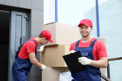 Removal team protecting furniture during a Bayswater move
