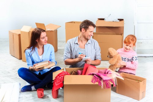 Loading furniture and boxes into a removal van in Bayswater