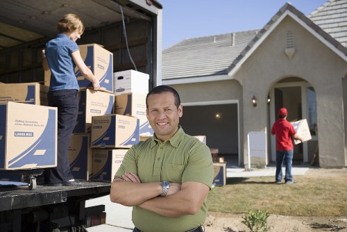 Packing and loading furniture into a moving van in Bayswater